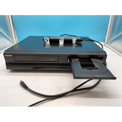 107 - Toshiba VHS/DVD Recorder DVR 20. W/O with Remote.