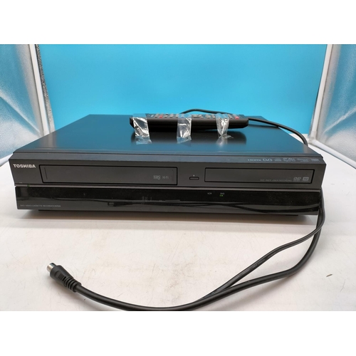107 - Toshiba VHS/DVD Recorder DVR 20. W/O with Remote.