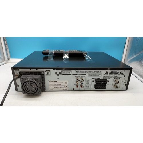 107 - Toshiba VHS/DVD Recorder DVR 20. W/O with Remote.