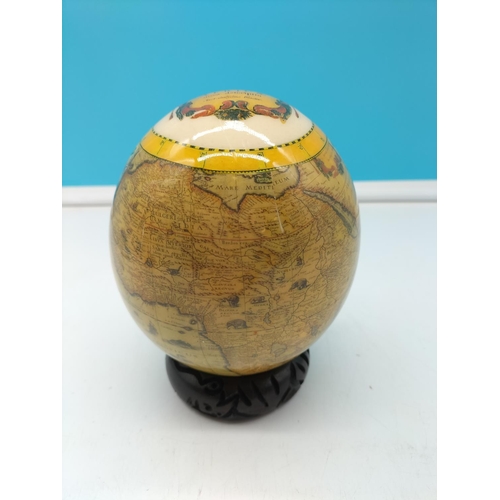 265 - Ostrich Egg with Wildlife Design on Stand. 17cm Tall.