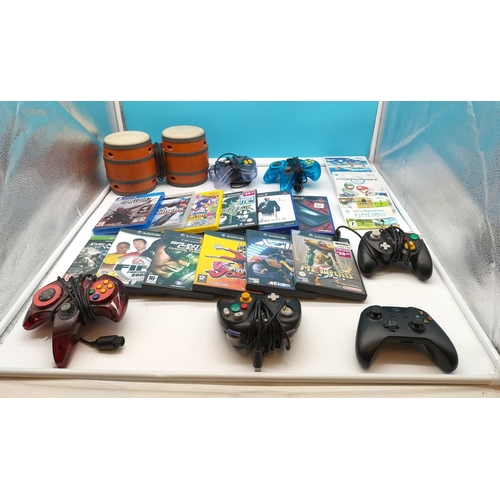 271 - Assortment of Nintendo, X-Box and Playstation Games and Controllers plus Donkey Kong Drums.