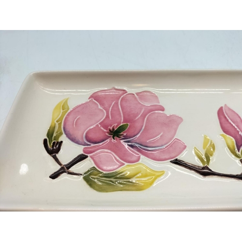 283 - Moorcroft 'Magnolia on Cream Ground' Pin Dish. Signed to Base. Some Crazing to Glaze. 21cm x 9cm.
