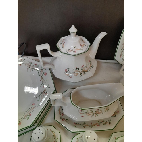 319 - Johnson Bros 'Eternal Beau' Dinner and Tea Service comprising 47 Pieces.