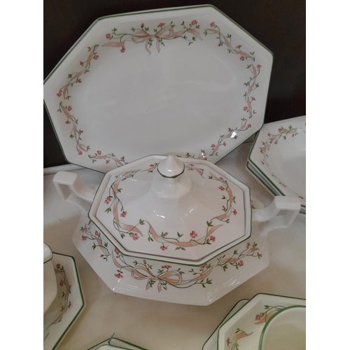 319 - Johnson Bros 'Eternal Beau' Dinner and Tea Service comprising 47 Pieces.