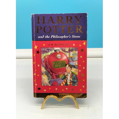 575 - First Edition, Second Print 'Harry Potter and the Philosophers Stone' Paperback Book by J.K.Rowling.