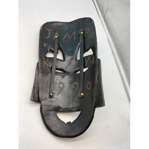 579 - Wooden African Mask. 38cm Long, 18cm Wide.