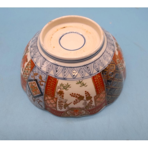 585 - Japanese 19th Century Imari Pattern Bowl. 8cm High, 19cm Diameter.