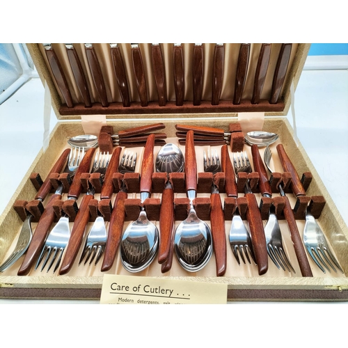 7 - 6 Setting (36 Piece) Glosswood Stainless Steel Cutlery Set in Case. Unused.