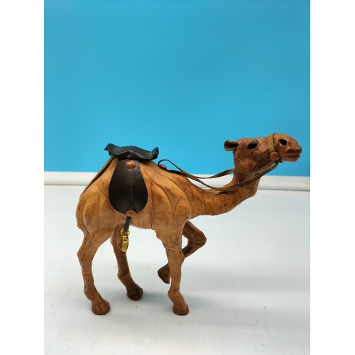 115 - Leather Figure of a Camel. 19cm High, 20 cm Long.