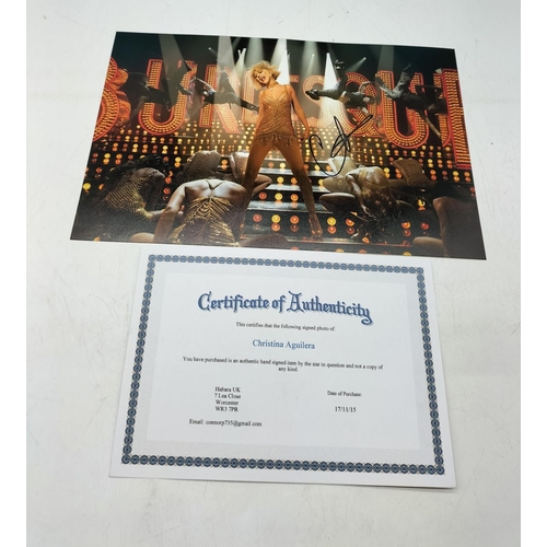 130A - Christina Aguilera Autographed Picture with Certificate of Authenticity. 30.5cm x 20cm.