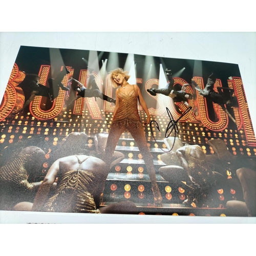 130A - Christina Aguilera Autographed Picture with Certificate of Authenticity. 30.5cm x 20cm.