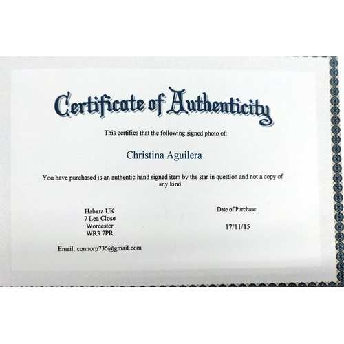 130A - Christina Aguilera Autographed Picture with Certificate of Authenticity. 30.5cm x 20cm.