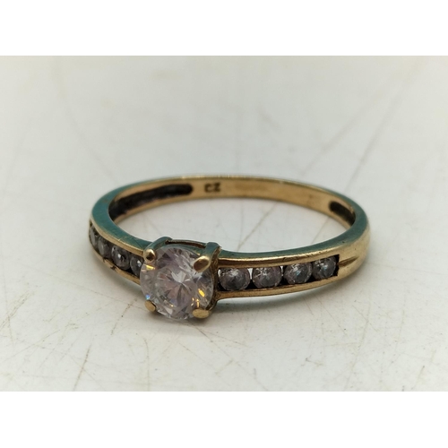 145A - 9ct Unmarked White Cubic Zirconia Merlee Stone set Ring. Size O1/2. 1.67 Grams.