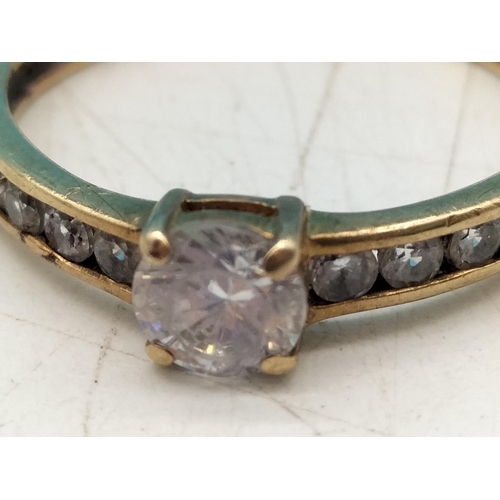145A - 9ct Unmarked White Cubic Zirconia Merlee Stone set Ring. Size O1/2. 1.67 Grams.
