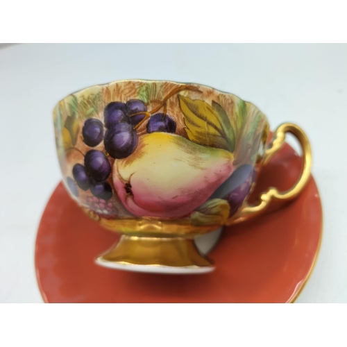 292 - Aynsley Maroon Red and Gold Gilt Saucer with Orchard Gold Cabinet Cup. Signed D Jones.