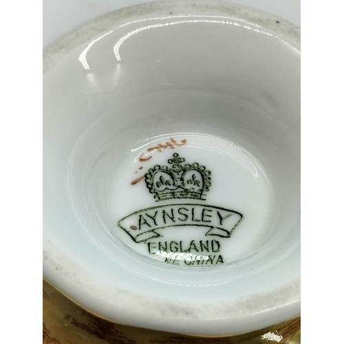 292 - Aynsley Maroon Red and Gold Gilt Saucer with Orchard Gold Cabinet Cup. Signed D Jones.