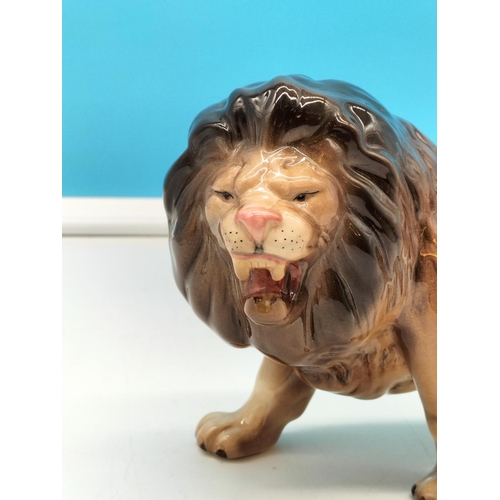 298 - Melba Ware Lion Figure. 15cm High x 27cm.