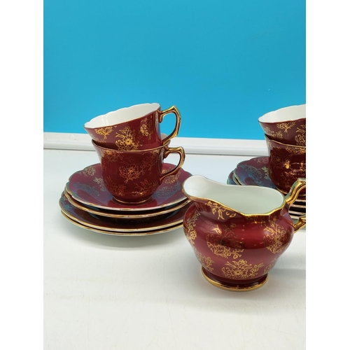 52 - Larie & Co London, 20 Piece Bone China Part Tea Set to include Cups, Saucers, Sugar and Cream.