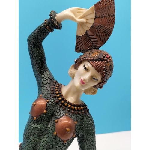 12 - Resin Figure of an Art Deco Flapper Girl. 37cm High, 23cm x 14cm.