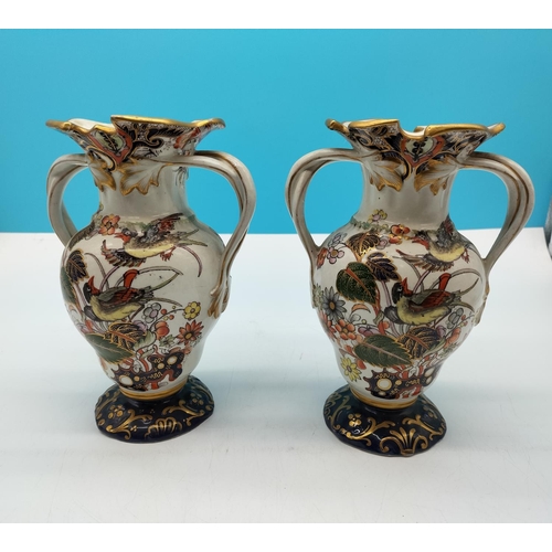 23 - Pair of 19th Century Twin Handled 21.5cm Ironstone Vases decorated with Exotic Birds and Flowers.