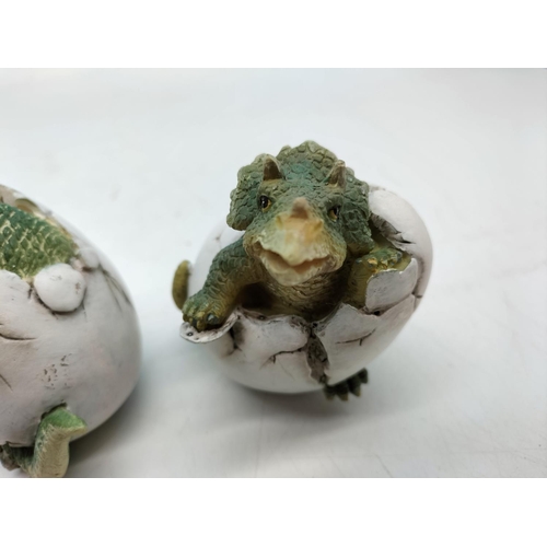 319 - Resin 'Dinosaurs Hatching Out of Eggs' Figures (4). 10cm Tall.