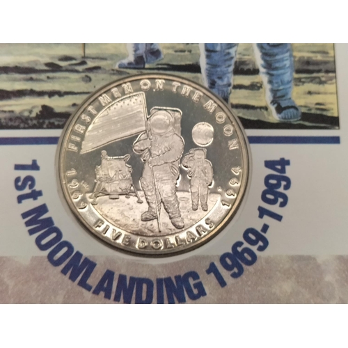 322 - 25th Anniversary of 1st Moon Landing Uncirculated 5 Dollar Commemorative Coin and Stamps 1969-1994.