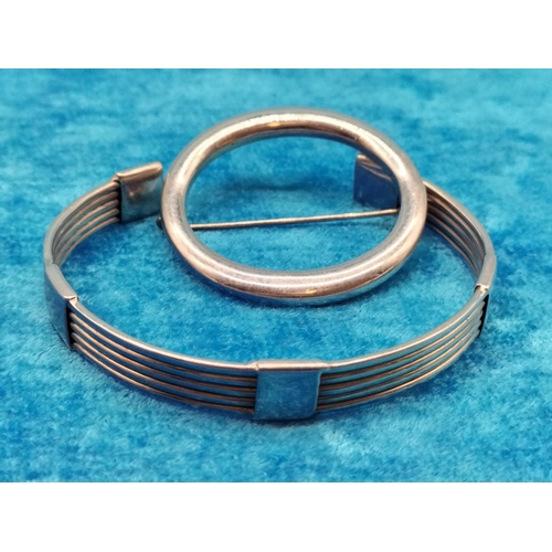 34 - 925 Silver Bangle and Brooch. 28 Grams.