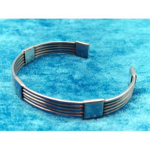 34 - 925 Silver Bangle and Brooch. 28 Grams.