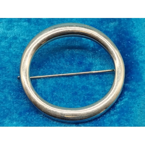 34 - 925 Silver Bangle and Brooch. 28 Grams.