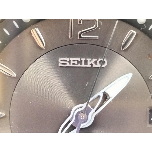 408 - Seiko Titanium 100m Quartz Watch. Requires Batteries. In Sekonda Box.