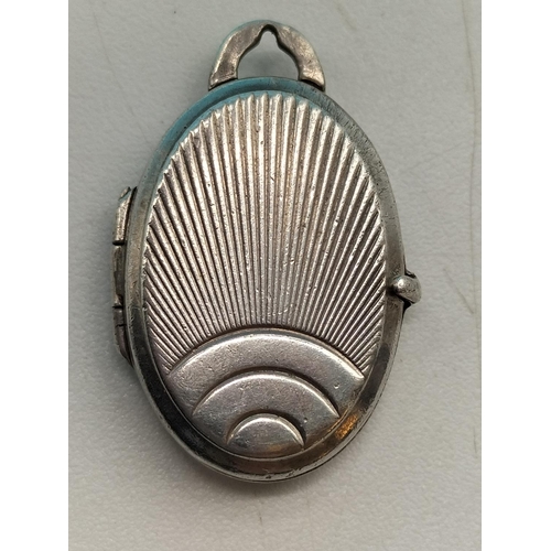 442 - Unmarked Silver 1930's Engine Turned Locket (2cm x 1cm) plus PDSA 925 Silver Brooch.