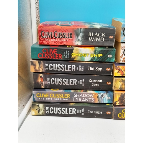 444 - Box of Clive Cussler Paperback Books.