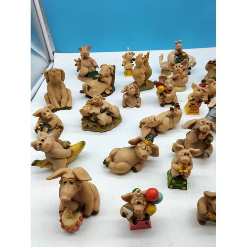 513 - Large Collection of 35 'Piggin' Figures.