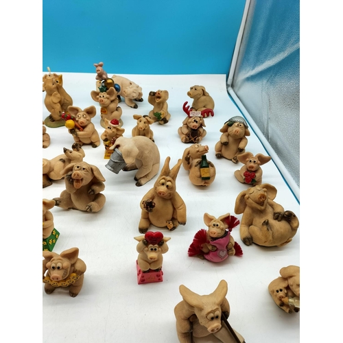 513 - Large Collection of 35 'Piggin' Figures.