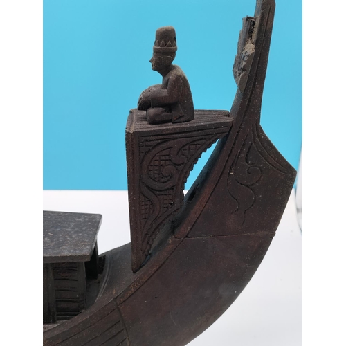 528 - Early 20th Century Wooden Balinese Tribal Boat on Modern Stand. 38cm High, 61cm x 14cm. Slight A/F.