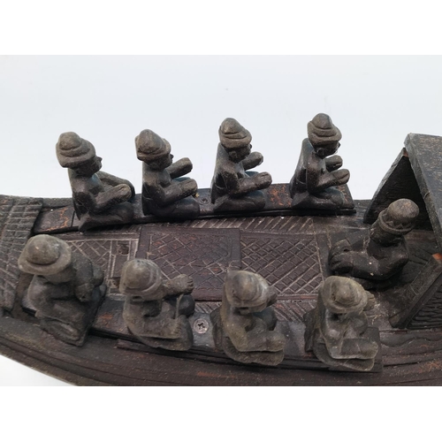 528 - Early 20th Century Wooden Balinese Tribal Boat on Modern Stand. 38cm High, 61cm x 14cm. Slight A/F.