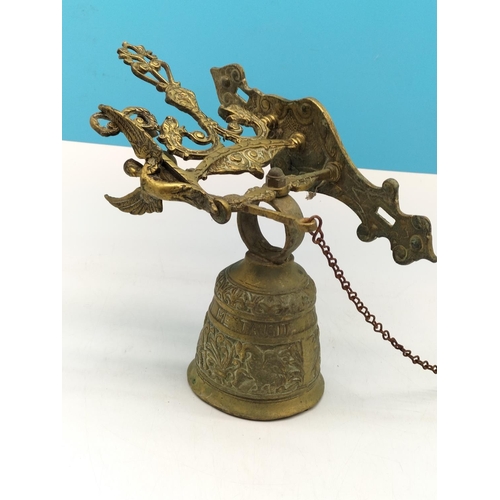 65 - Large Ornate Brass Swing Bell with Chain. 36cm High, Bell Diameter 11cm.