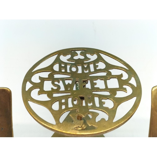 78 - 3 x Brass Tilt Top Style Trivets to include 'Home Sweet Home'. 1 A/F requires Tightening. 13cm High,... 