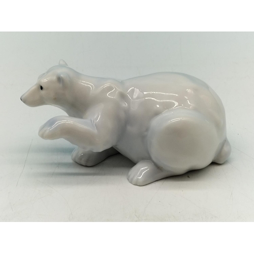 79 - Figure of a Polar Bear. Marked to Base. 6cm High x 13cm.