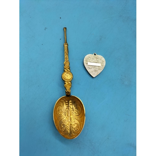 109 - Reproduction of 1953 Queen's Coronation Gold Plated Anointing Spoon plus a St Christopher Pendant.