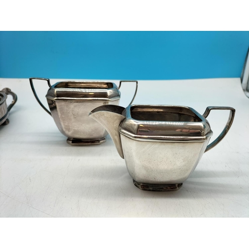 173 - Silver Plate Teapot, Hot Water Pot, Sugar and Cream on a Twin Handled Tray (41cm x 23cm).