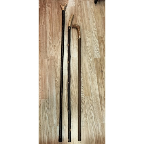 200A - Wooden Carved Handle Walking Sticks (3). Longest 136cm.