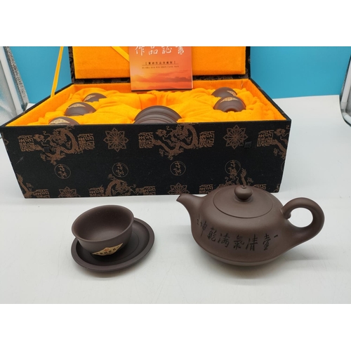 235 - Boxed Zhen Cang Zheng Shu Tea Set with Certificate of Authenticity.