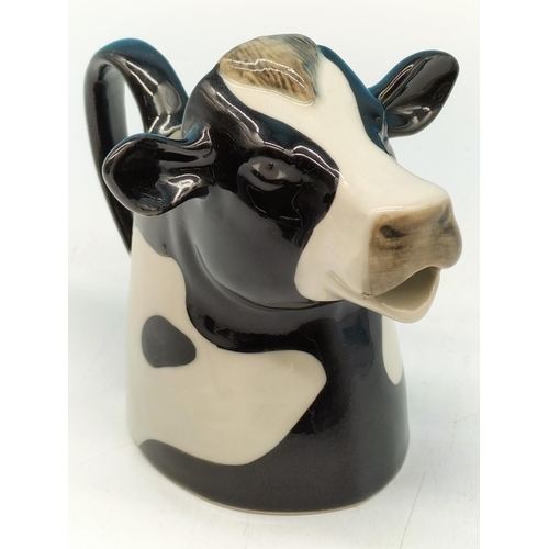 30A - Quail Pottery 'Friesian Cow' Half Pint Milk Jug. 13cm Tall.