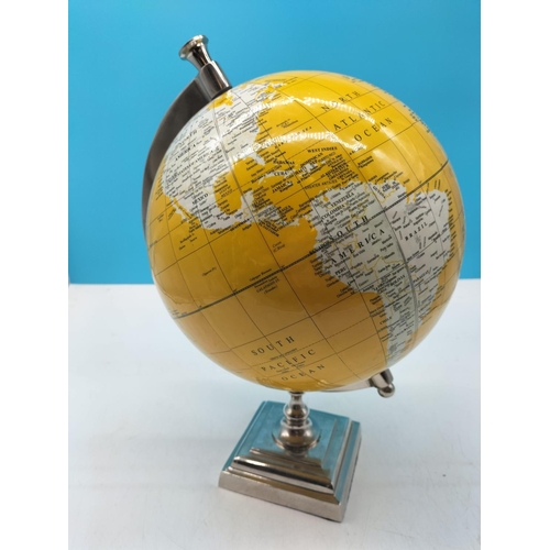 570 - Chrome Based Modern Globe. 40cm High, approx 26cm Diameter.