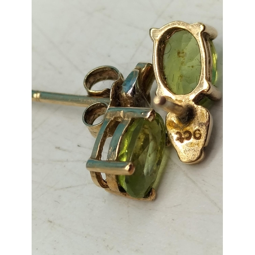 85A - 9ct Gold Green Stone Earrings.