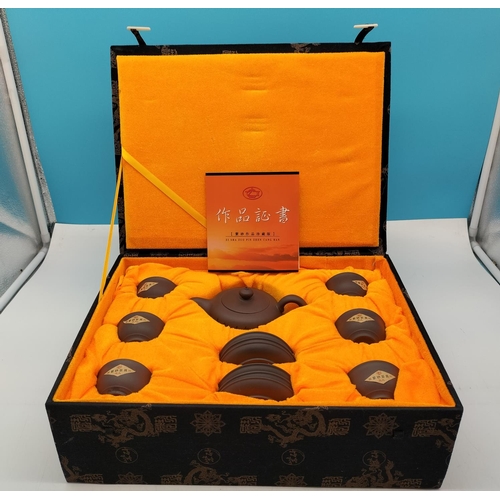 655 - Boxed Zhen Cang Zheng Shu Tea Set with Certificate of Authenticity.