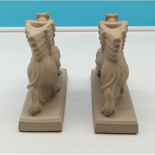 1 - Pair of Wedgwood Bisque 2003 'Griffin' Candle Holders. 16cm High, 19cm x 7cm.