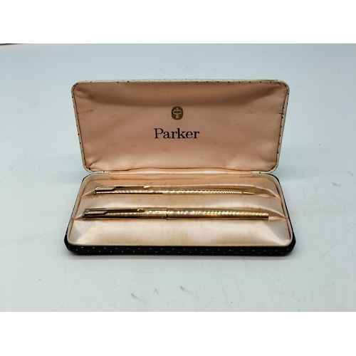 21 - Cased Parker Pen Set with 12ct Rolled Gold Cases. One with 14ct Gold Nib.