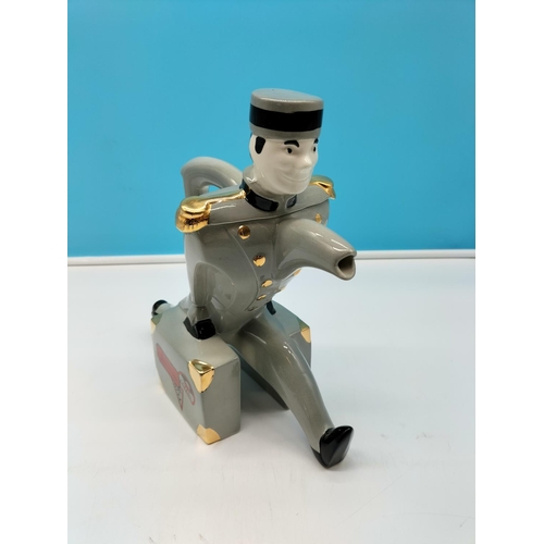 3 - Swineside 'Bell Hop Boy' Teapot. 26cm High, 11cm x 27cm.